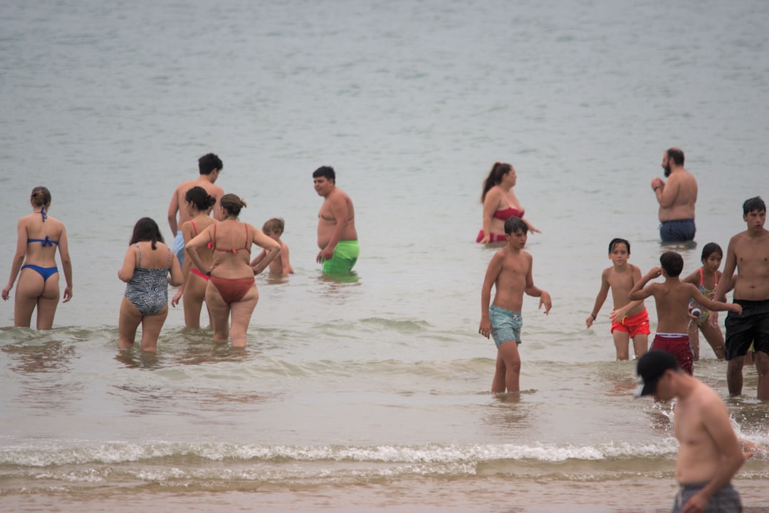 Jeju Hyeopjae beach turquoise water children playing family summer 2026