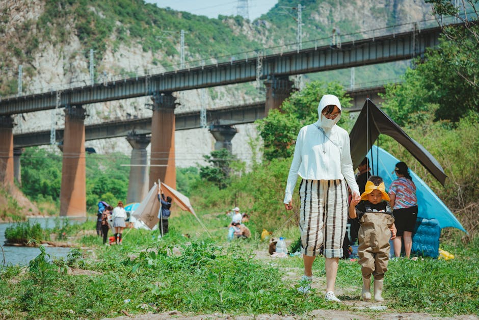 family camping Korea, tent forest riverside children