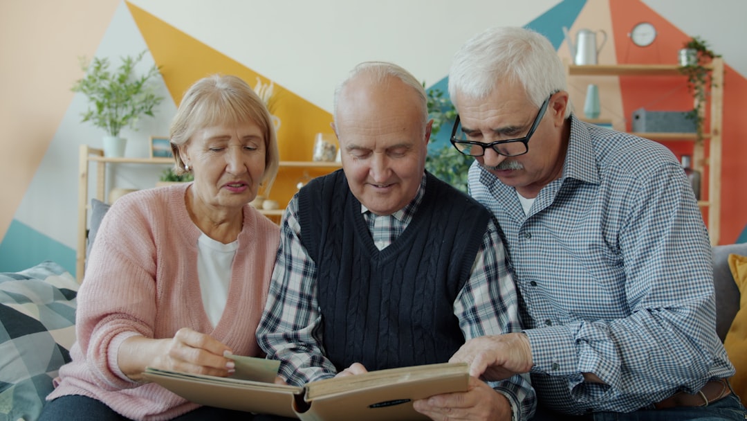 Medicare insurance premium comparison, senior reviewing healthcare paperwork