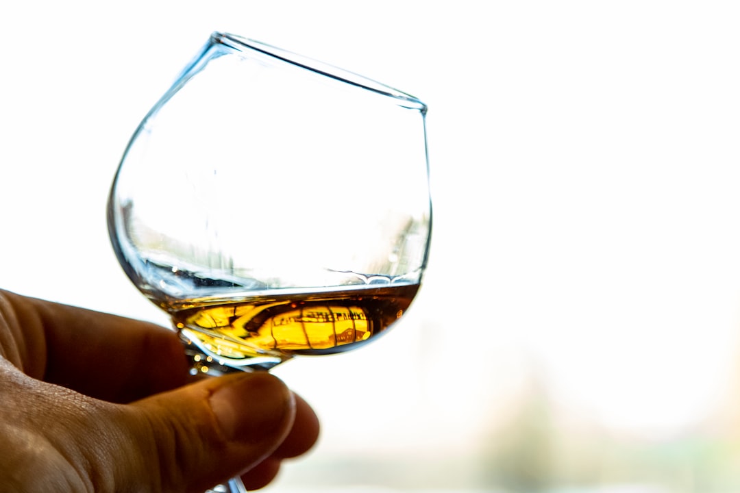 single malt whisky bottle collection, whisky tasting glass amber