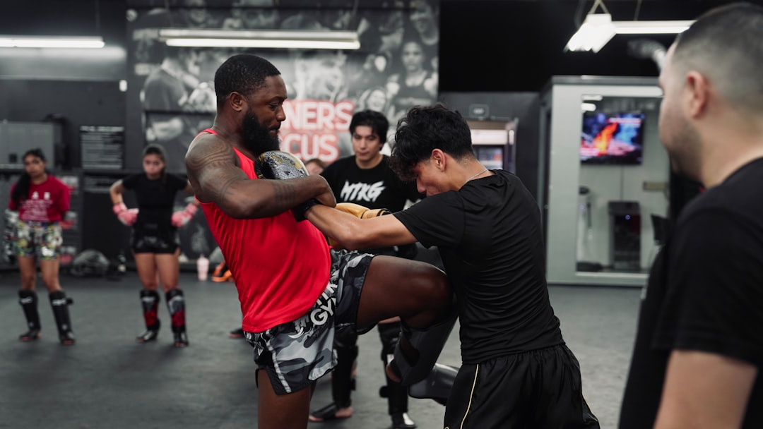 Muay Thai beginner training, shin guard sparring session