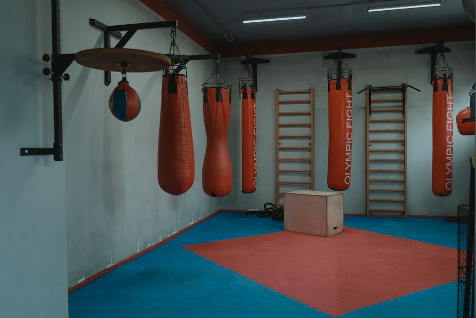 Muay Thai gym interior, boxing equipment wall